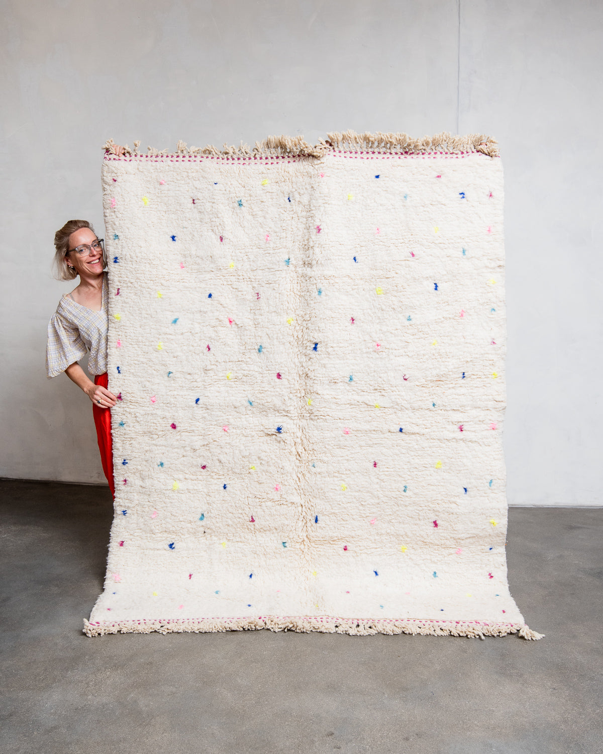 Modern, designer, handcrafted Berber rug from Morocco. Beniourain carpet with beautiful colours and patterns and fluffy wool texture.